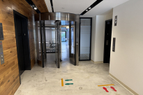 115. Suite 100